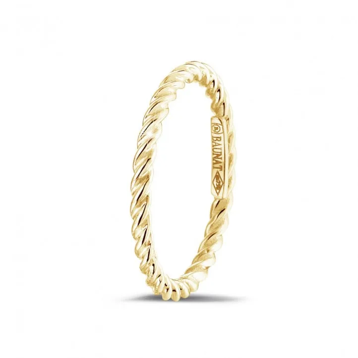 Anillo trenzado de combinación en oro amarillo 