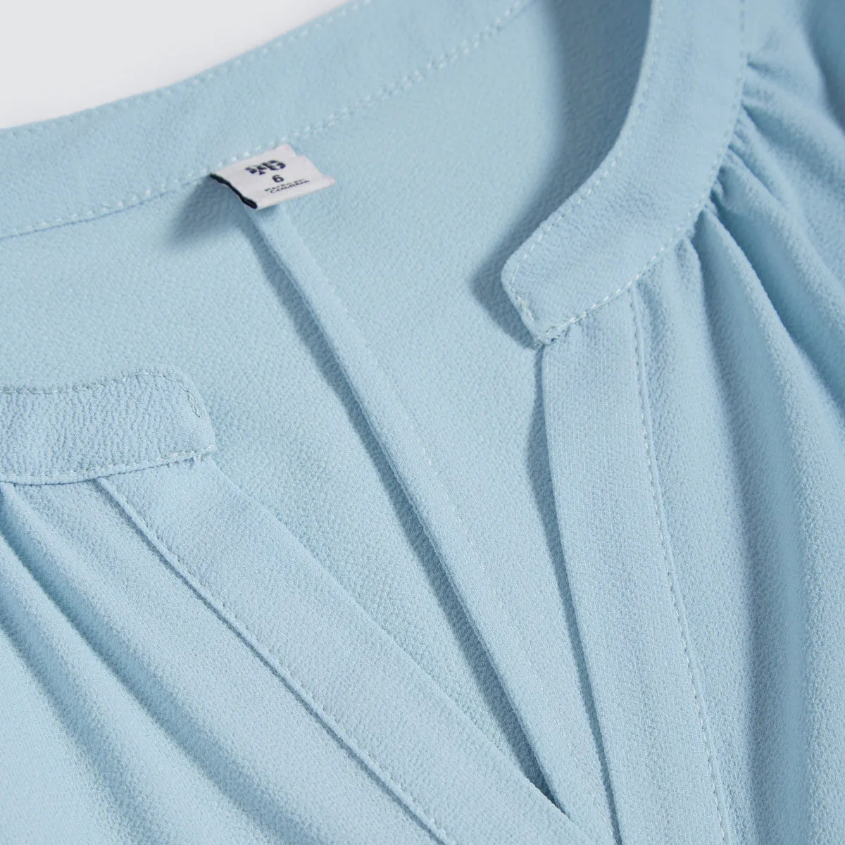 Blusa con Escote en V