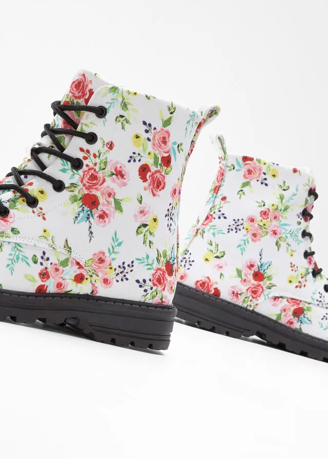 BOTAS CON CORDONES ESTAMPADO DE FLORES EN BLANCOROSA