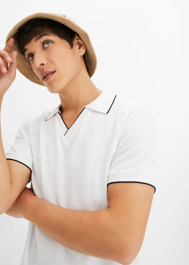 CAMISETA DE TIPO POLO BLANCONEGRO
