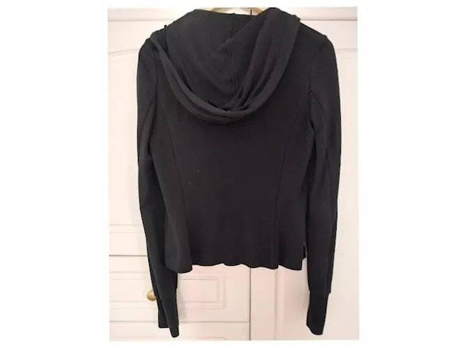 Carla G. Chaquetas Negro 