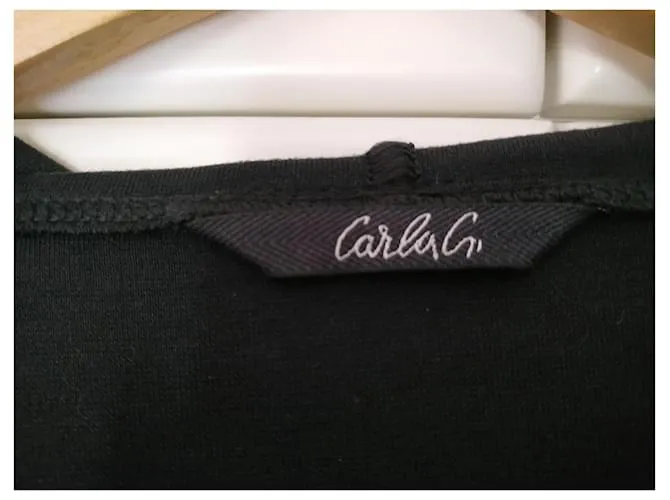 Carla G. Chaquetas Negro 