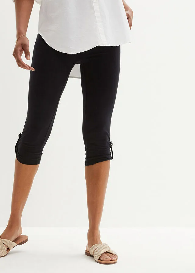 Leggings capri con botón Negro