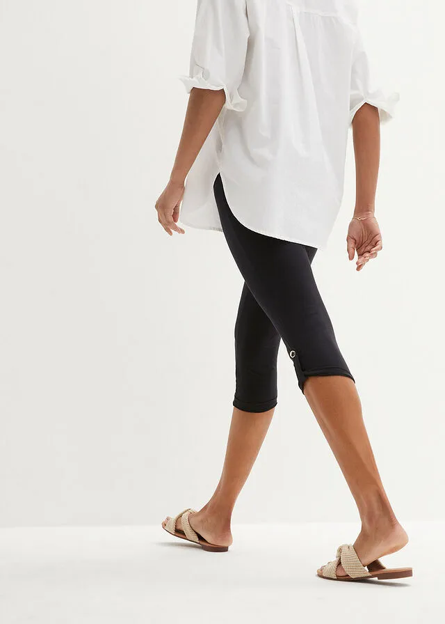 Leggings capri con botón Negro