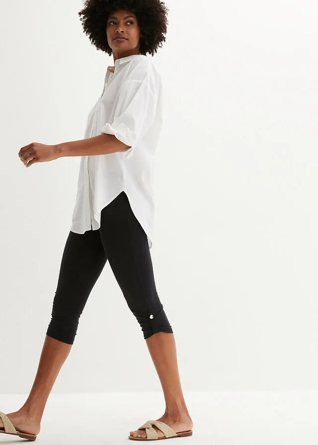 Leggings capri con botón Negro