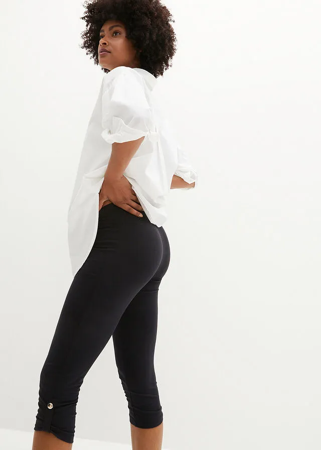 Leggings capri con botón Negro
