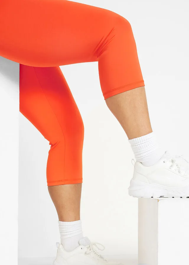 Leggings capri deportivos con bolsillo oculto en la cintura Negro