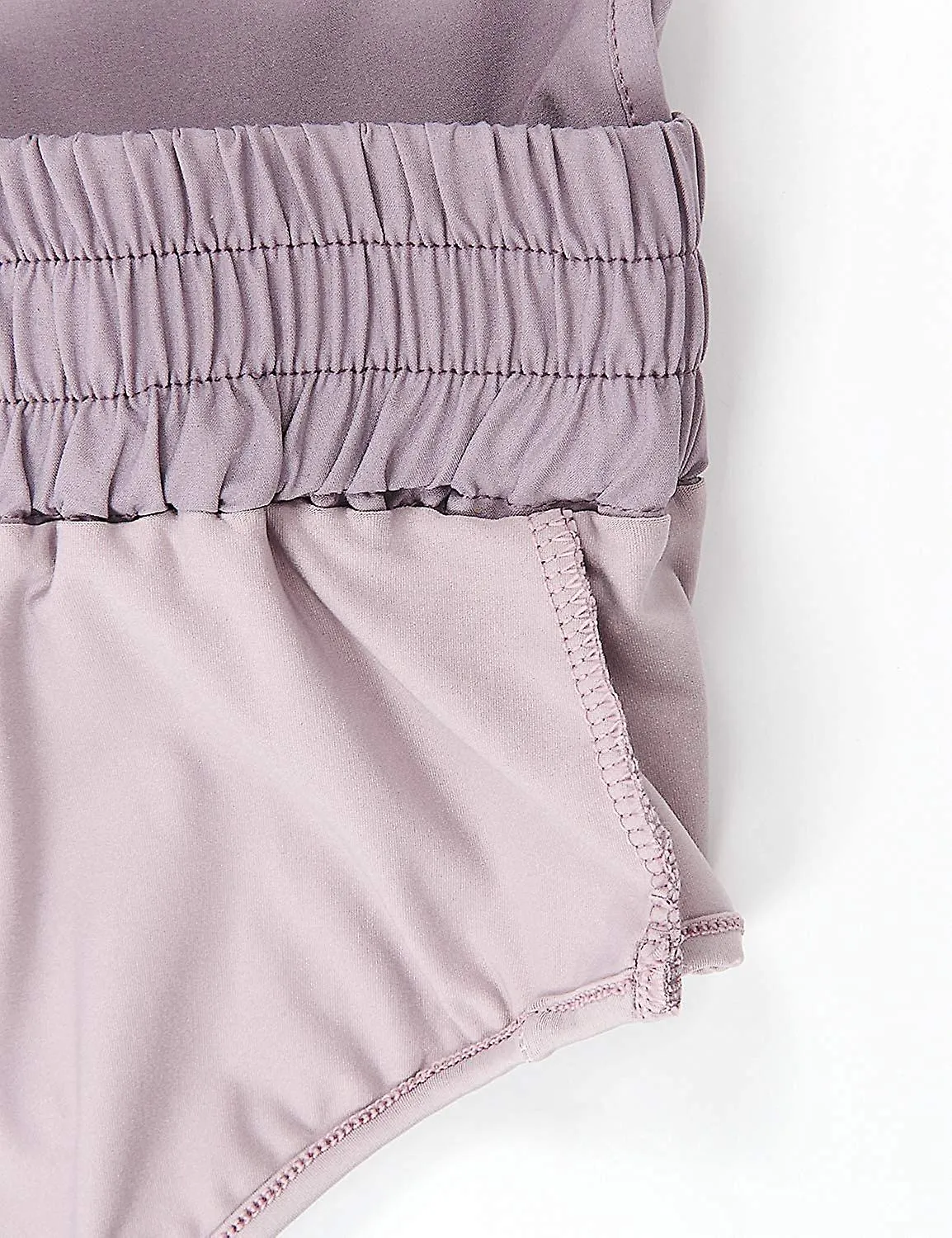 Pantalones cortos de carrera en seco rápido para mujeres pantalones cortos atléticos bolsillos con cremallera trasera