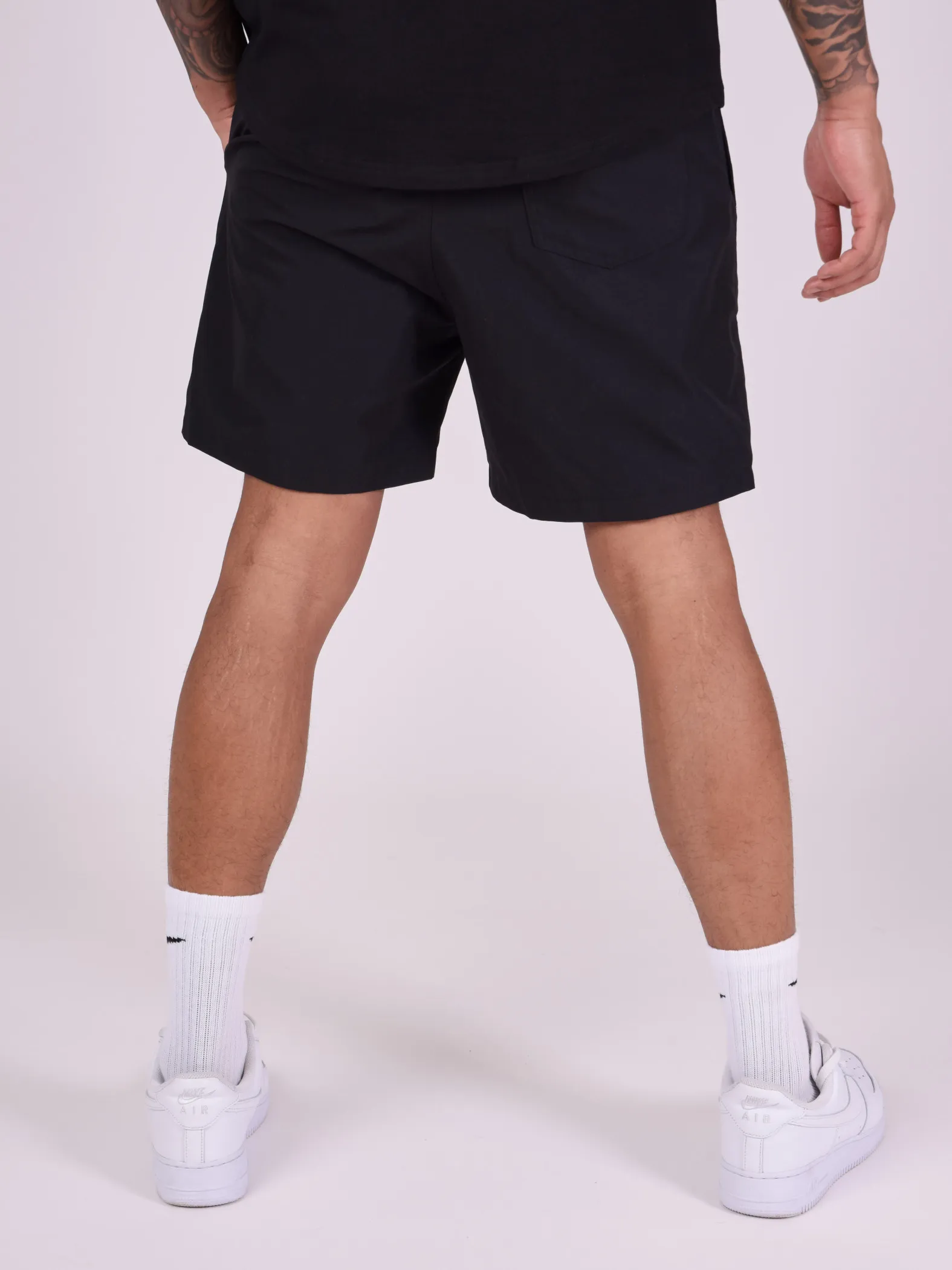 Pantalón corto con logotipo impreso en degradado de gran tamaño