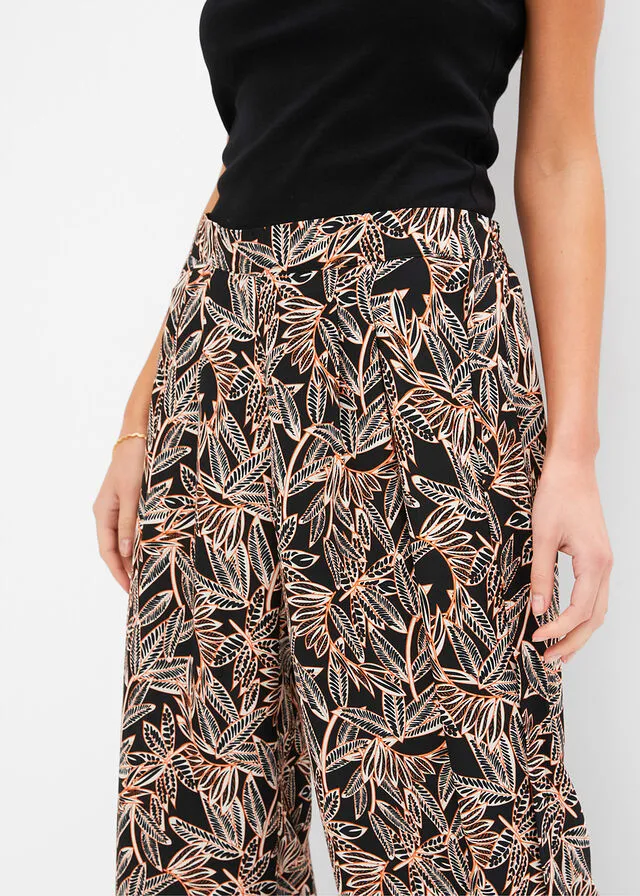 Pantalón palazzo con abertura Negro/crudo/naranja estampado