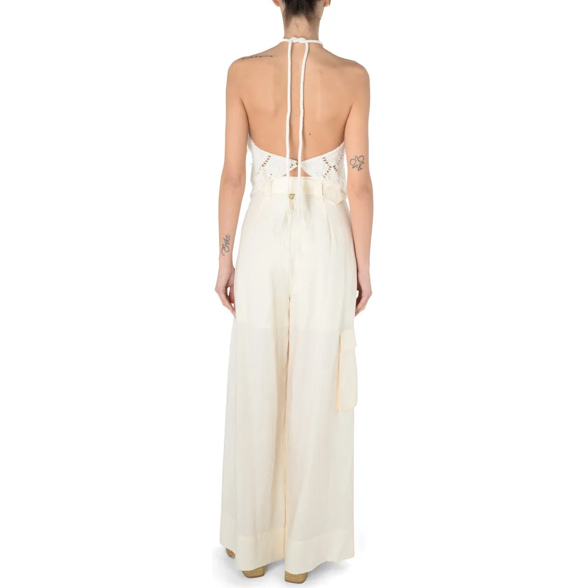 Top  con plumas blancas como la nieve