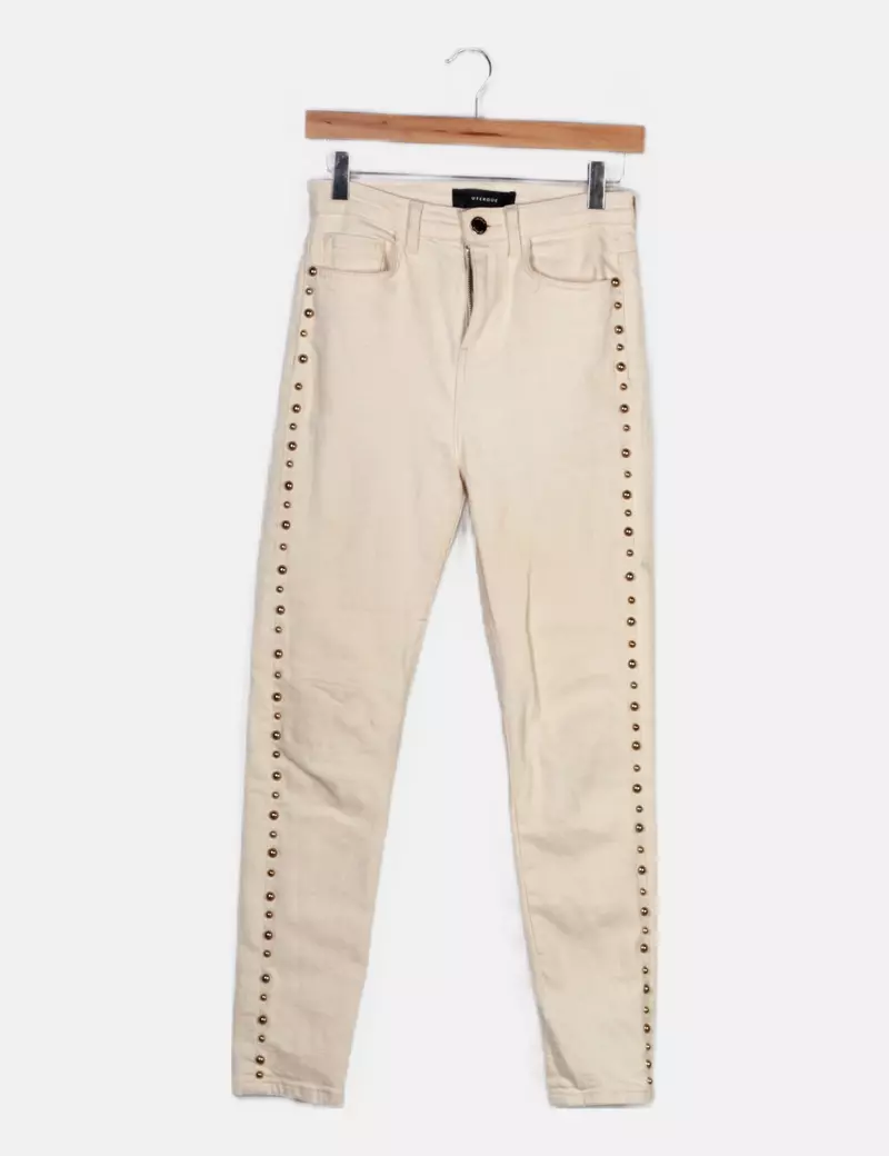 Uterqüe Pantalón beige con tachas